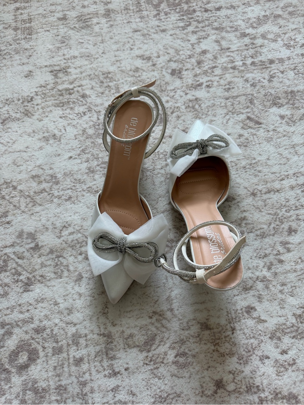 De Blossom Collection White Bow Pointed-Toe Ankle Strap Heels with Silver Accent